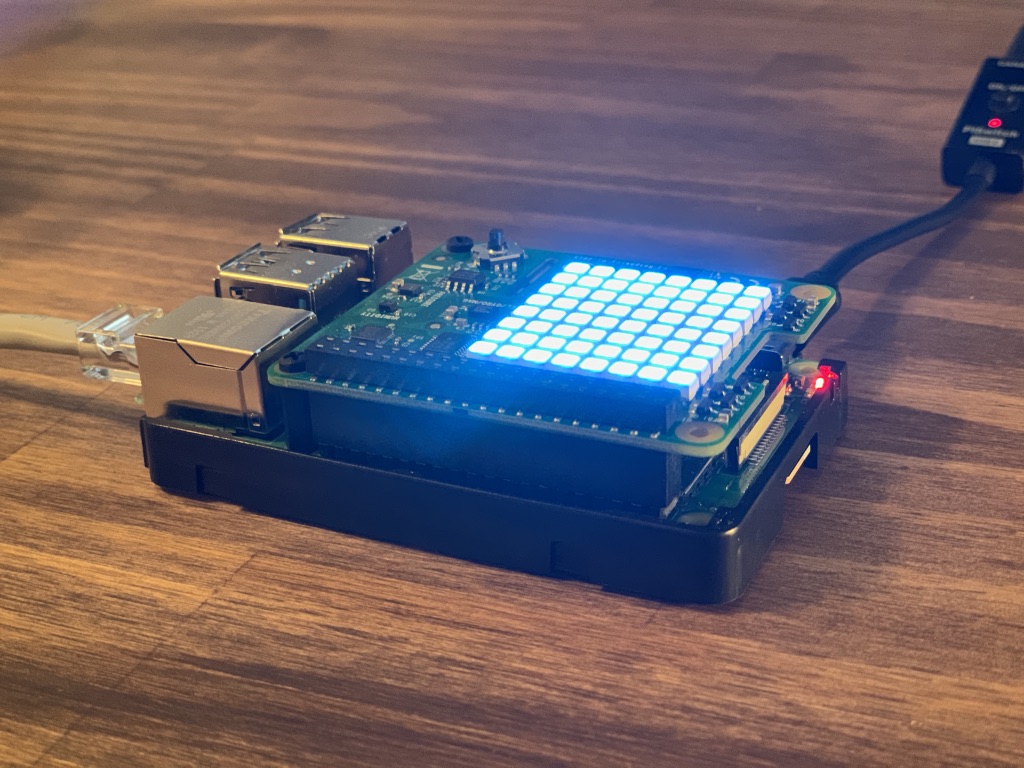 Raspberry Pi with blue andon color on Sense HAT